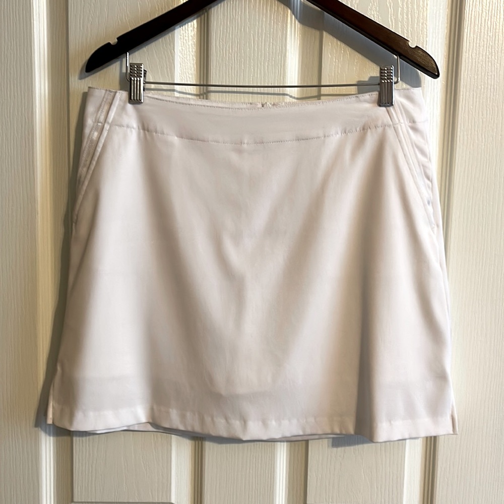 CLOSET CLEAN OUT Ladies Golf tops, skorts,& shorts! % off offered on multiples!
